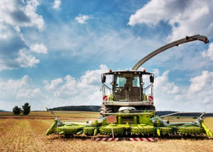 machine harvesting fields